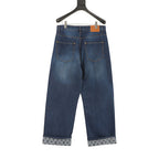 Louis Vuitton Distressed Patchwork Denim Trousers